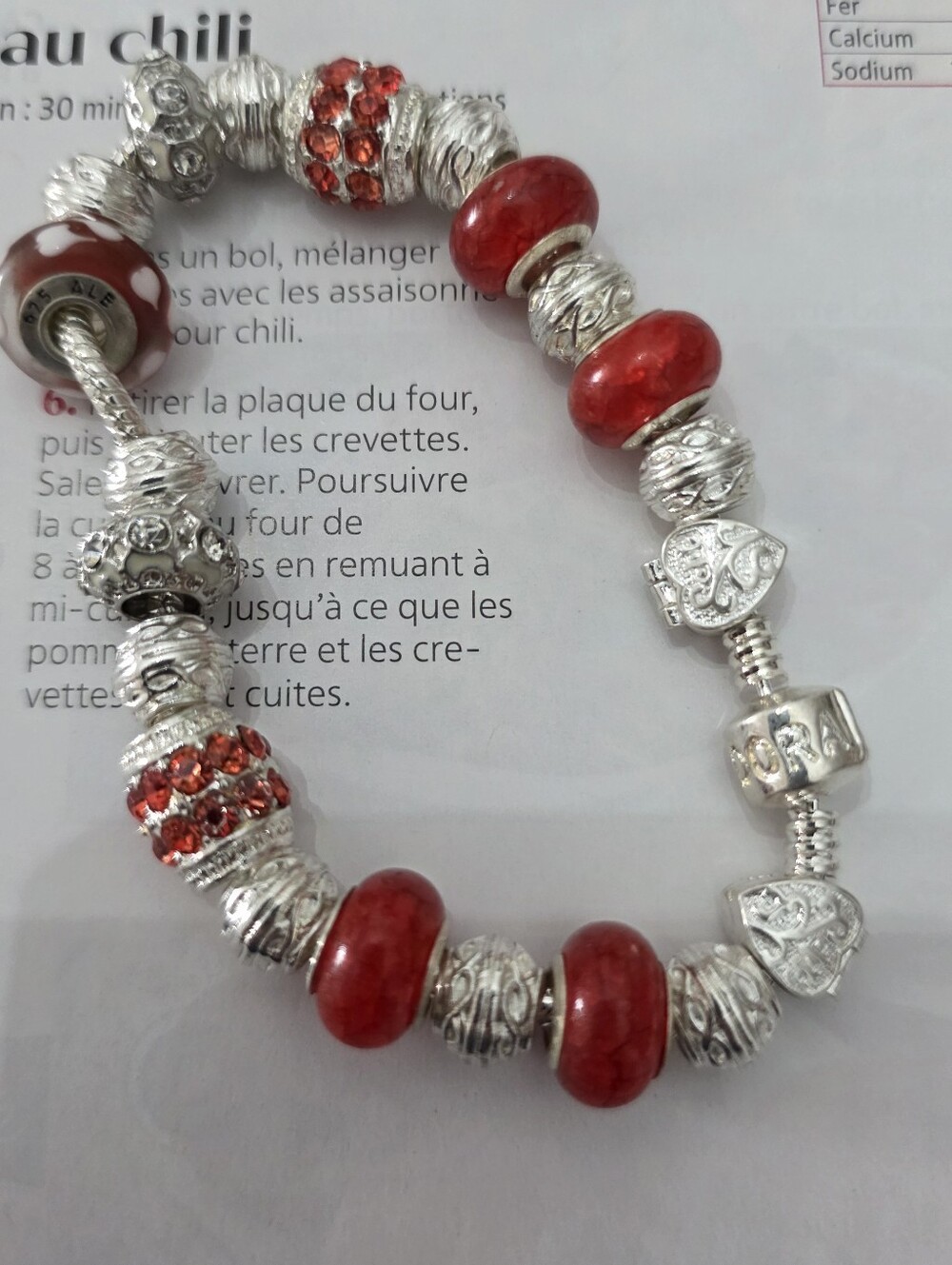 7-inch Pandora-style bracelet with a genuine Pandora bead (see photos).
